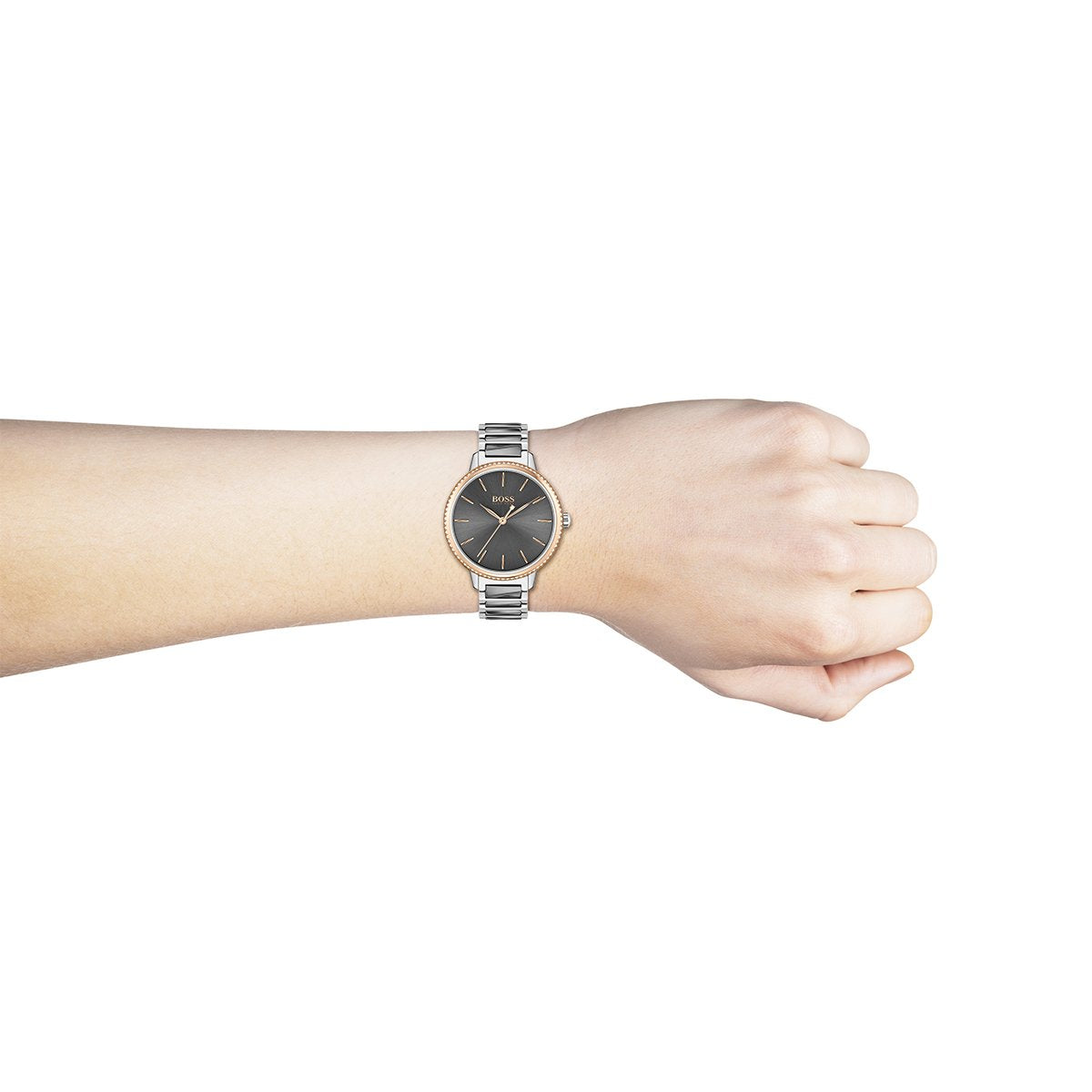 grey and rose gold tone ladies Hugo Boss watch on a wrist