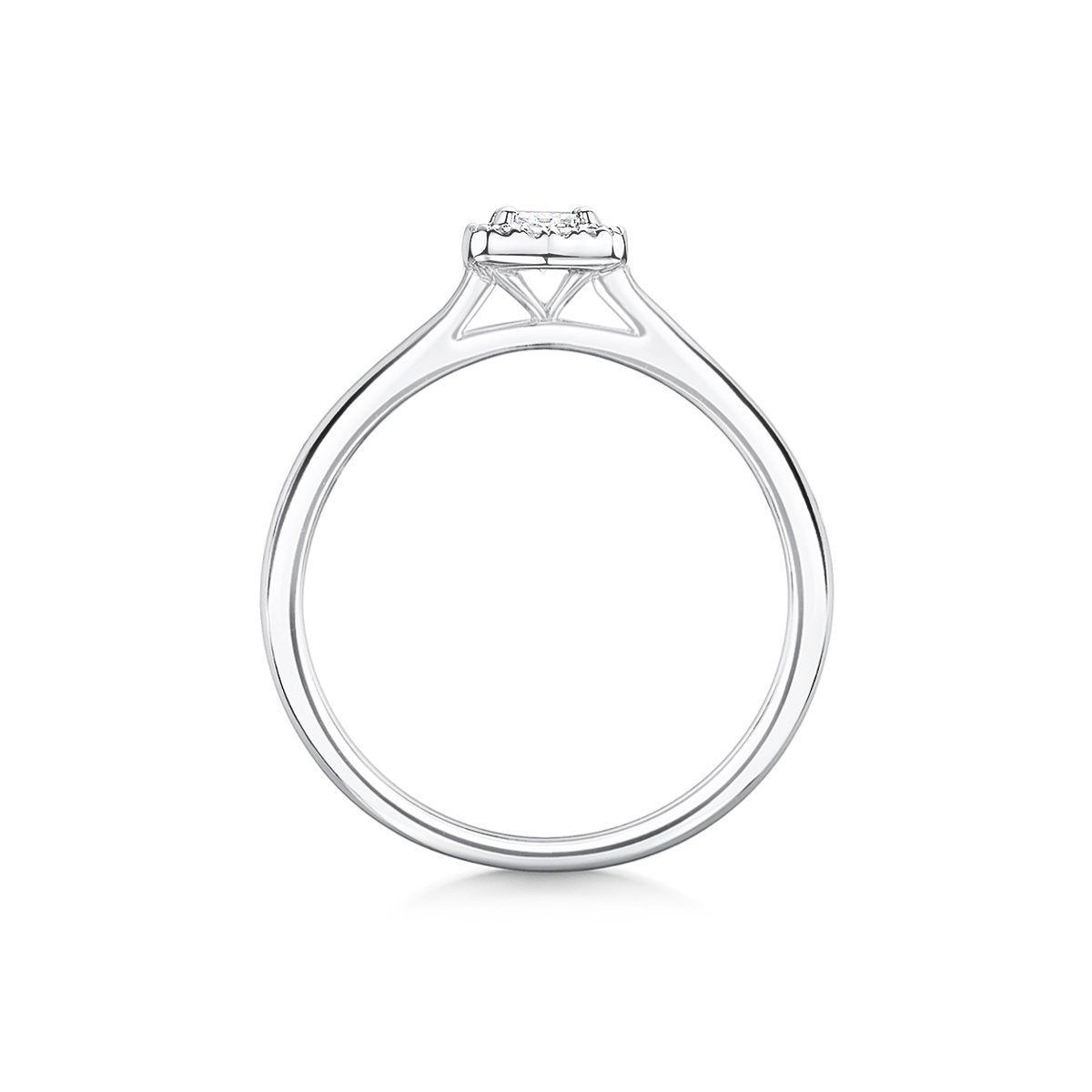 side angle of beautiful halo emerald cut engagement ring