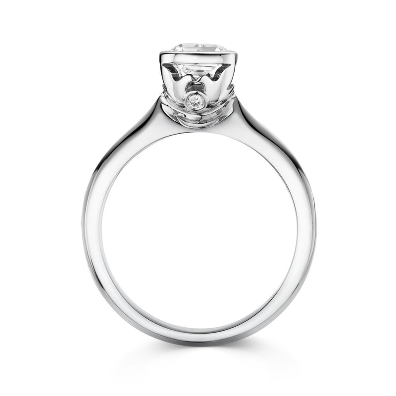unique diamond engagement ring with secret diamond and dove motif 