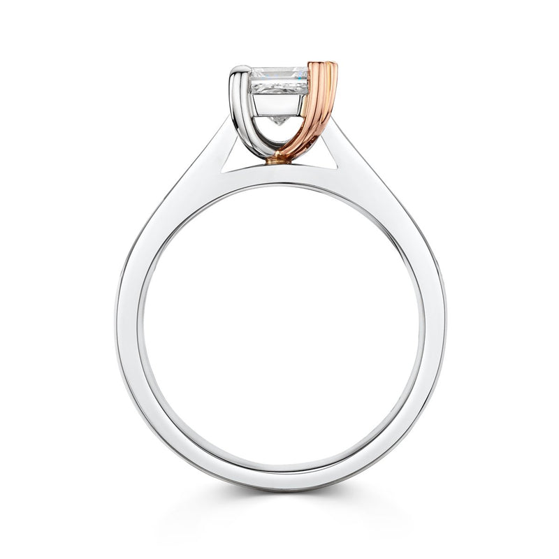 side view of sweetheart engagement ring with rose gold claw