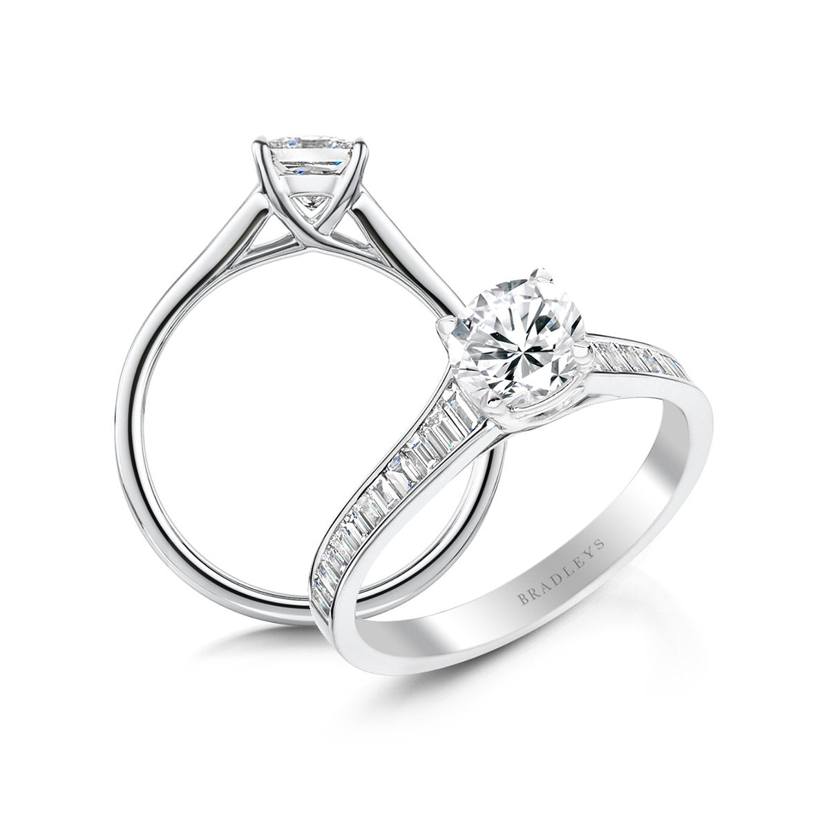 round brilliant cut engagement ring with elegant baguette cut diamond shoulders