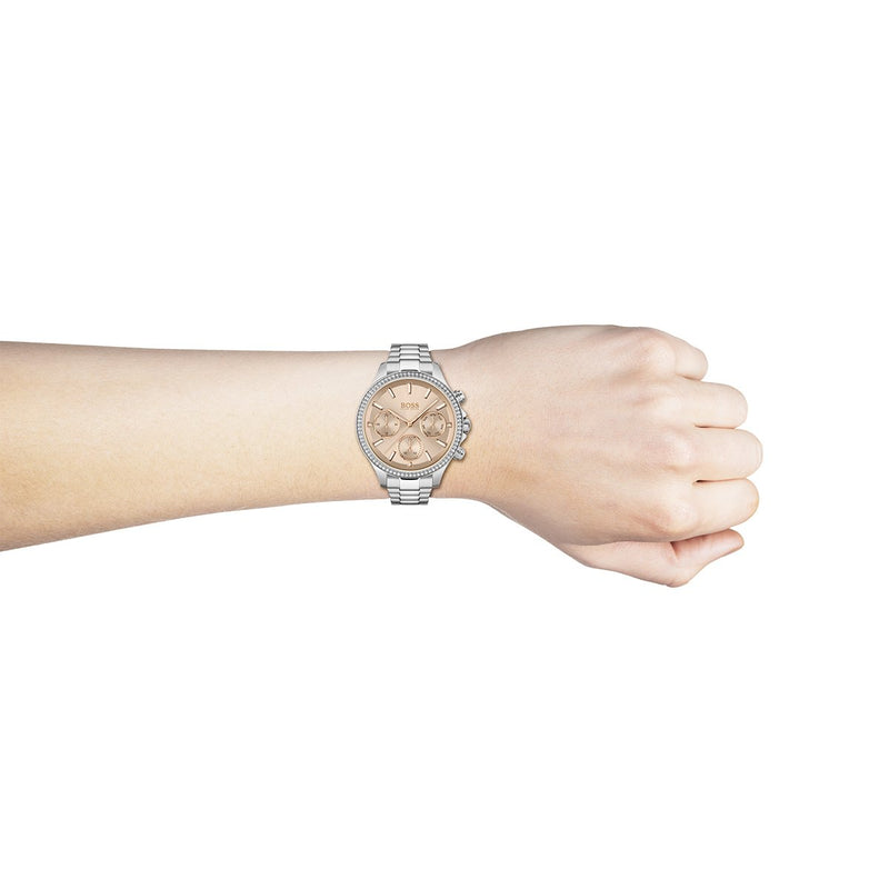lady wearing rose gold dial with three sub dials Hugo Boss watch