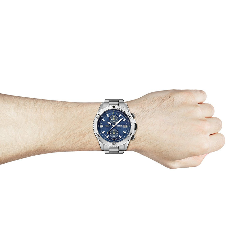 Hugo Boss watch with blue chronograph dial with silver bracelet on wrist