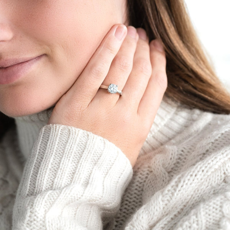 lady wearing ballerina diamond engagement Ring