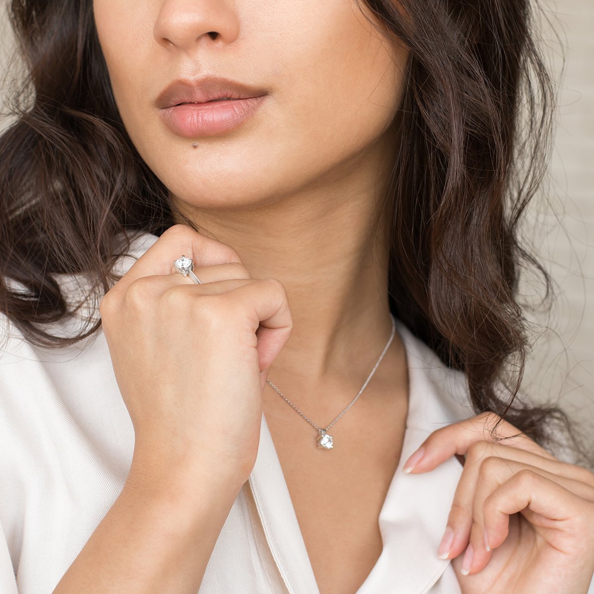 lady wearing classic engagement ring