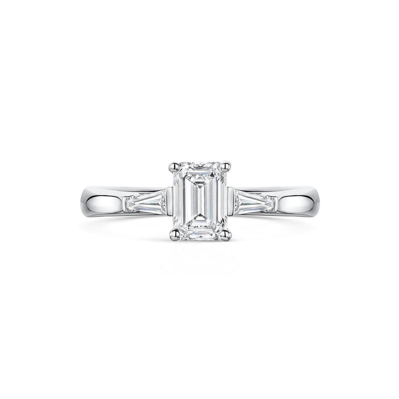 platinum and emerald cut with baguette cut shoulder three stone engagement ring