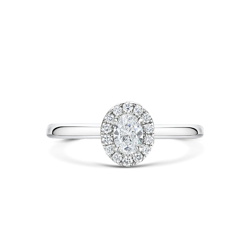 face of view of diamond platinum oval cut halo ring with plain shoulders