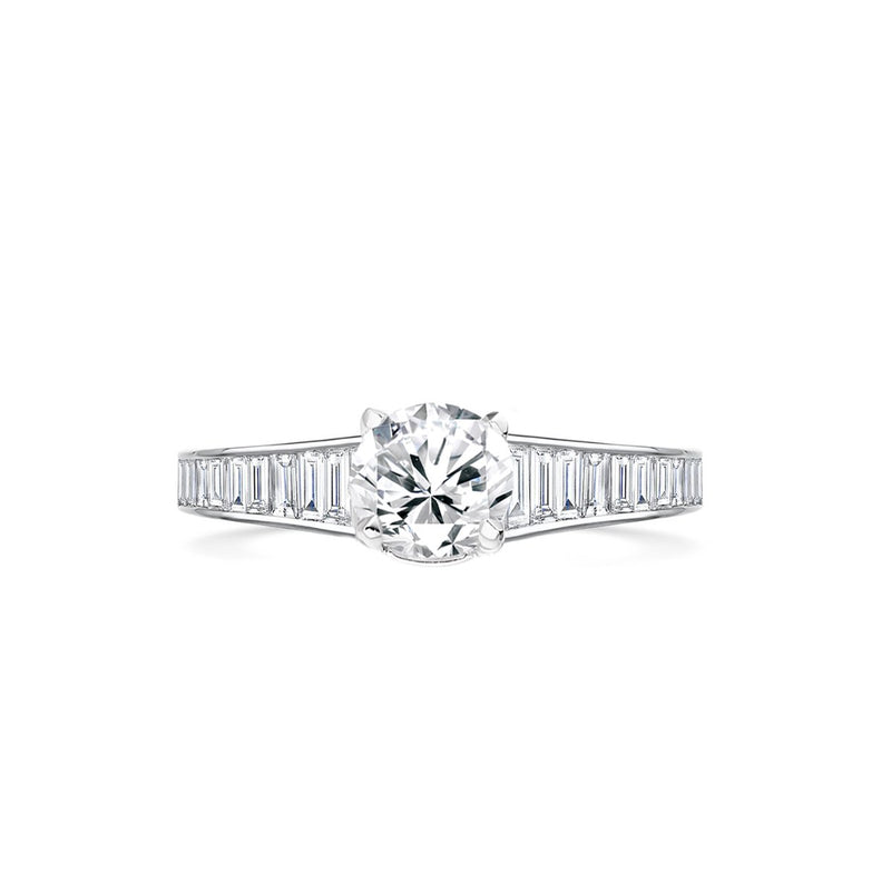 front angle of round brilliant cut engagement ring  with elegant baguette cut diamond shoulders